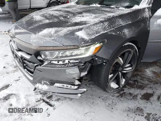 2018 Honda Accord Sedan Sport 1.5T with VIN 1HGCV1F31JA087538, listed as a IAAI auction lot 41479031 with 131,159 mi miles. Bid and sale history available at carsss.com. Image 6.