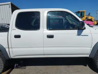 2001 Toyota Tacoma PreRunner z VIN 5TEGN92N91Z852586, wystawiony jako IAAI lot #42299321 z przebiegiem 233 111 mil mil oraz . Historia ofert i sprzedaży dostępna na DreamBid. Obrazek 13.