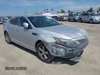 2015 Kia Optima LX with VIN 5XXGM4A74FG381316, listed as a IAAI auction lot 41885940 with 128,984 mi miles. Bid and sale history available at carsss.com. Image 1.