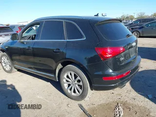 2014 Audi Q5 Premium Plus z VIN WA1LFAFP9EA130988, wystawiony jako IAAI lot #41835596 z przebiegiem 91 303 mil mil oraz . Historia ofert i sprzedaży dostępna na DreamBid. Obrazek 3.