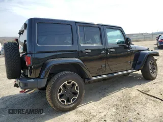 2016 Jeep Wrangler Unlimited Rubicon with VIN 1C4HJWFG4GL107777, listed as a Copart auction lot 48974135 with 118,164 mi miles and Salvage Title. Bid and sale history available at carsss.com. Image 3.