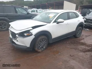 2024 Mazda CX-30 2.5 S with VIN 3MVDMBAM0RM645873, listed as a IAAI auction lot 41423763 with 34,259 mi miles. Bid and sale history available at carsss.com. Image 2.