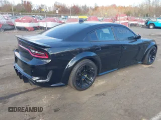 2020 Dodge Charger SRT Hellcat z VIN 2C3CDXL91LH128675, wystawiony jako IAAI lot #40805177 z przebiegiem 43 619 mil mil oraz . Historia ofert i sprzedaży dostępna na DreamBid. Obrazek 4.
