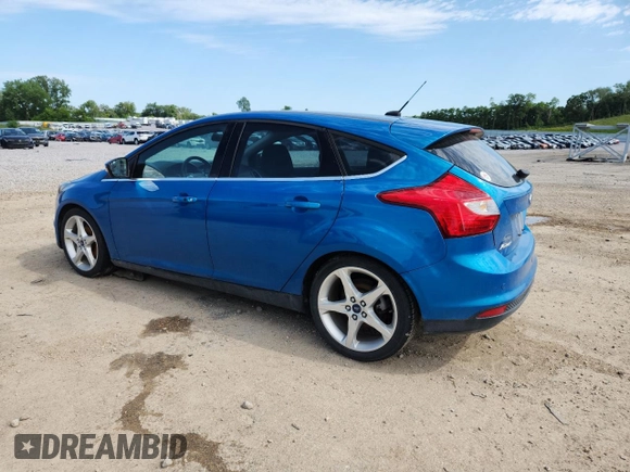 2014 Ford Focus Titanium with VIN 1FADP3N21EL198009, listed as a Copart auction lot 61939335 with 133,792 mi miles and Clean title. Bid and sale history available at DreamBid. Image 2.