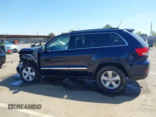 2012 Jeep Grand Cherokee Laredo with VIN 1C4RJFAG0CC160255, listed as a IAAI auction lot 41967809 with 127,702 mi miles. Bid and sale history available at carsss.com. Image 15.