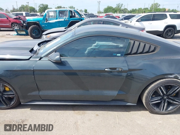 2016 Ford Mustang EcoBoost z VIN 1FA6P8TH0G5289907, wystawiony jako IAAI lot #42057565 z przebiegiem 129 917 mil mil oraz . Historia ofert i sprzedaży dostępna na DreamBid. Obrazek 14.