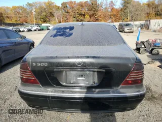 2003 Mercedes-Benz S-Class 5.0L with VIN WDBNG75J13A343070, listed as a Copart auction lot 77412604 with 154,533 mi miles and Salvage Title. Bid and sale history available at carsss.com. Image 6.