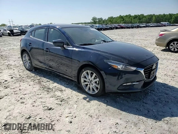 2017 Mazda 3 Grand Touring z VIN JM1BN1M3XH1117241, wystawiony jako Copart lot #53499295 z przebiegiem 63 886 mil mil oraz Szkoda całkowita • Salvage title. Historia ofert i sprzedaży dostępna na DreamBid. Obrazek 11.