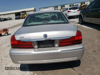 2005 Mercury Grand Marquis GS with VIN 2MEFM74W75X609454, listed as a Copart auction lot 53794905 with 65,441 mi miles and Salvage Title. Bid and sale history available at DreamBid. Image 6.