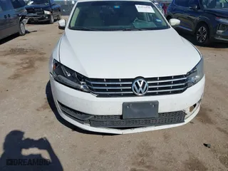 2014 Volkswagen Passat TDI SE w/Sunroof with VIN 1VWBN7A32EC016554, listed as a IAAI auction lot 41472156 with 178,149 mi miles. Bid and sale history available at carsss.com. Image 6.