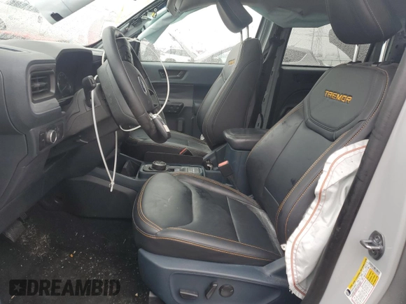 2023 Ford Maverick z VIN 3FTTW8G94PRA99298, wystawiony jako Copart lot #47267125 z przebiegiem 12 560 mil mil oraz Szkoda całkowita • Salvage title. Historia ofert i sprzedaży dostępna na DreamBid. Obrazek 7.