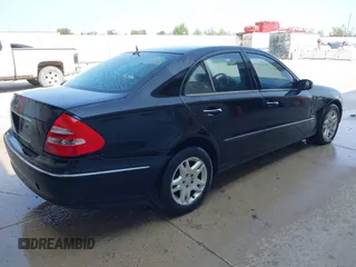 2003 Mercedes-Benz E-Class 3.2L with VIN WDBUF65J93A234140, listed as a IAAI auction lot 40313345 with 1 mi miles. Bid and sale history available at carsss.com. Image 4.