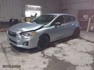2019 Subaru Impreza with VIN 4S3GTAA6XK3751073, listed as a IAAI auction lot 41727552 with 131,982 mi miles. Bid and sale history available at carsss.com. Image 2.