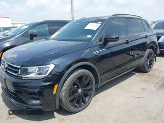 2021 Volkswagen Tiguan SE z VIN 3VV3B7AX0MM047478, wystawiony jako IAAI lot #42144239 z przebiegiem 55 468 mil mil oraz . Historia ofert i sprzedaży dostępna na DreamBid. Obrazek 18.