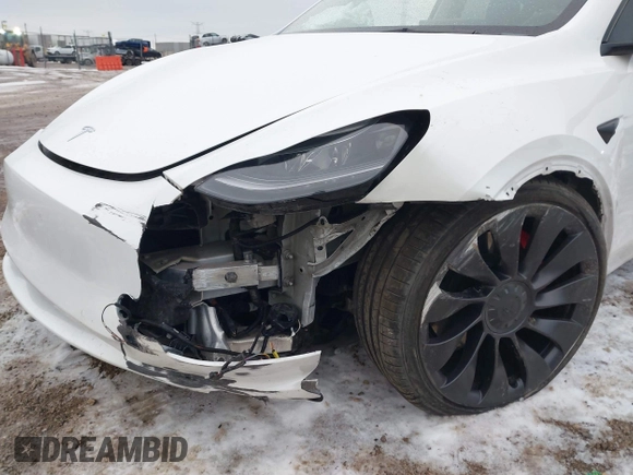 2021 Tesla Model Y Performance with VIN 5YJYGDEF6MF261711, listed as a IAAI auction lot 41176208 with 25,687 mi miles and . Bid and sale history available at DreamBid. Image 6.