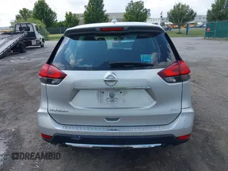 2017 Nissan Rogue SV with VIN 5N1AT2MV5HC798823, listed as a IAAI auction lot 42556631 with 157,721 mi miles and . Bid and sale history available at DreamBid. Image 16.