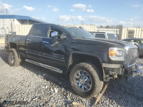 2017 GMC Sierra 2500HD Denali with VIN 1GT12UEY6HF232938, listed as a Copart auction lot 49150515 with 116,949 mi miles and Salvage Title. Bid and sale history available at carsss.com. Image 4.