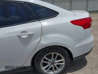 2017 Ford Focus SE z VIN 1FADP3F24HL207613, wystawiony jako IAAI lot #42596200 z przebiegiem 151 347 mil mil oraz . Historia ofert i sprzedaży dostępna na DreamBid. Obrazek 6.