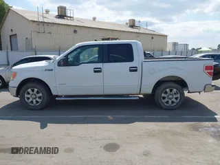 2014 Ford F-150 XL with VIN 1FTFW1CT8EKF55164, listed as a IAAI auction lot 42111483 with 233,166 mi miles. Bid and sale history available at carsss.com. Image 15.