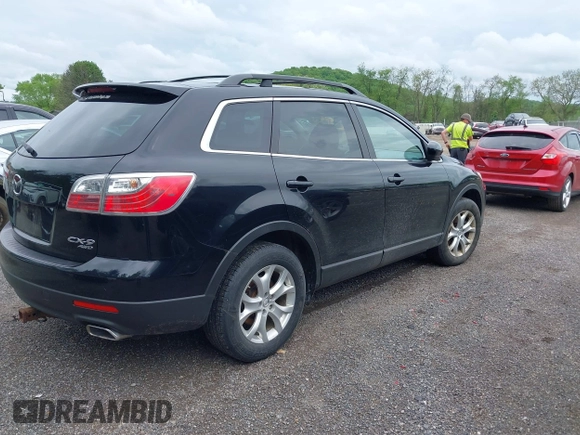 2011 Mazda CX-9 Touring z VIN JM3TB3CV6B0324256, wystawiony jako IAAI lot #42245746 z przebiegiem 128 420 mil mil oraz . Historia ofert i sprzedaży dostępna na DreamBid. Obrazek 4.