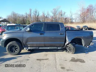 2012 Toyota Tundra 4WD Truck with VIN 5TFDW5F10CX259337, listed as a IAAI auction lot 41854421 with 168,577 mi miles. Bid and sale history available at carsss.com. Image 14.