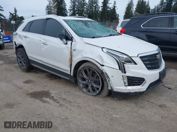 2019 Cadillac XT5 Luxury AWD z VIN 1GYKNDRS2KZ301027, wystawiony jako IAAI lot #41750374 z przebiegiem 44 328 mil mil oraz . Historia ofert i sprzedaży dostępna na DreamBid. Obrazek 1.