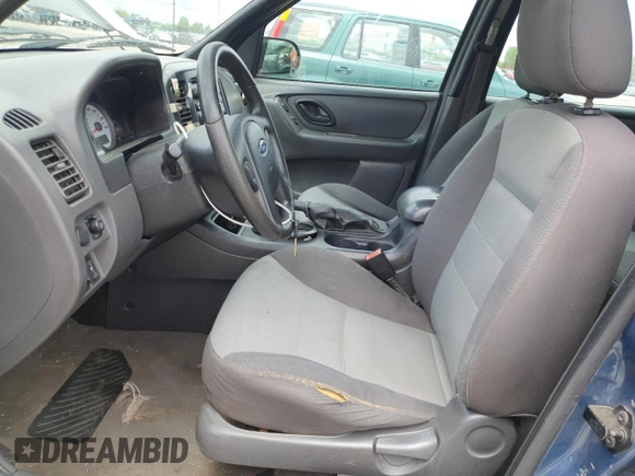 2005 Ford Escape XLS Value with VIN 1FMYU92Z95DA22100, listed as a Copart auction lot 57874705 with 192,057 mi miles and Salvage title. Bid and sale history available at DreamBid. Image 7.