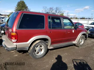 1999 Ford Explorer XLT with VIN 1FMDU34E7XZA60386, listed as a Copart auction lot 86851594 with 218,592 mi miles and Salvage title. Bid and sale history available at DreamBid. Image 3.