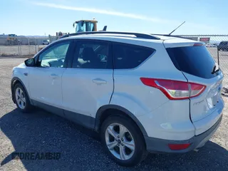 2016 Ford Escape SE with VIN 1FMCU9G95GUC63027, listed as a IAAI auction lot 41838955 with 95,283 mi miles. Bid and sale history available at carsss.com. Image 3.