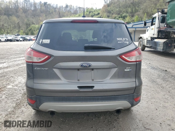 2013 Ford Escape SE with VIN 1FMCU9G94DUB78336, listed as a Copart auction lot 52025645 with 191,026 mi miles and Salvage Title. Bid and sale history available at DreamBid. Image 6.