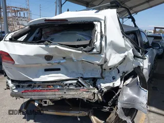 2021 Volkswagen Atlas SE z VIN 1V2HR2CA8MC514027, wystawiony jako IAAI lot #42260413 z przebiegiem 37 687 mil mil oraz . Historia ofert i sprzedaży dostępna na DreamBid. Obrazek 6.