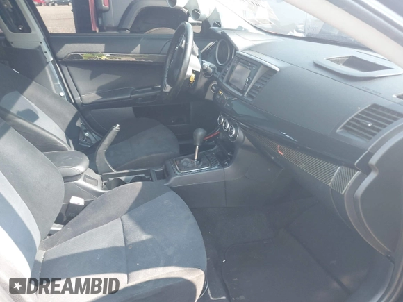 2014 Mitsubishi Lancer GT with VIN JA32U8FW6EU015415, listed as a IAAI auction lot 40171318 with 40,000 mi miles. Bid and sale history available at carsss.com. Image 5.