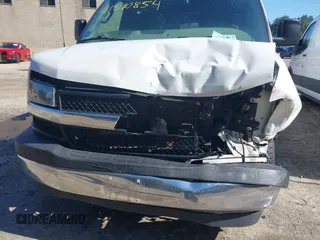 2018 Chevrolet Express Cargo Van with VIN 1GCWGAFG3J1907420, listed as a IAAI auction lot 41510854 with 91,112 mi miles. Bid and sale history available at carsss.com. Image 6.