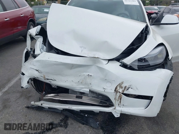 2024 Tesla Model Y with VIN 7SAYGDED6RF166543, listed as a IAAI auction lot 41713362 with Not Provided miles and . Bid and sale history available at DreamBid. Image 6.
