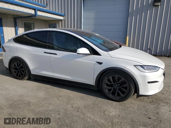 2022 Tesla Model X with VIN 7SAXCDE51NF342652, listed as a Copart auction lot 42756105 with Not Provided miles and Salvage Title. Bid and sale history available at DreamBid. Image 4.