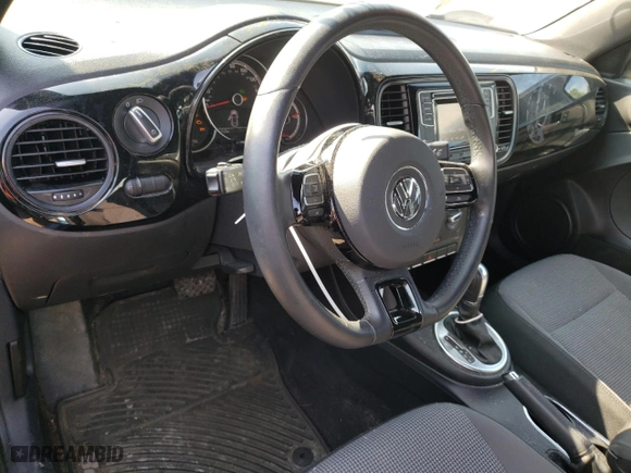 2019 Volkswagen Beetle S with VIN 3VWFD7AT4KM710256, listed as a Copart auction lot 60459994 with 93,877 mi miles and Salvage Title. Bid and sale history available at carsss.com. Image 8.
