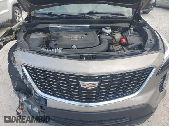 2022 Cadillac XT4 FWD Luxury with VIN 1GYAZAR4XNF121008, listed as a Copart auction lot 77599974 with 29,141 mi miles and Salvage title. Bid and sale history available at DreamBid. Image 12.