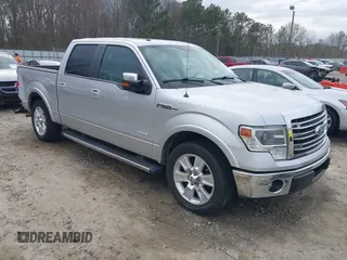 2013 Ford F-150 XL with VIN 1FTFW1CT1DFB14421, listed as a IAAI auction lot 41698573 with 243,033 mi miles and . Bid and sale history available at carsss.com. Image 1.