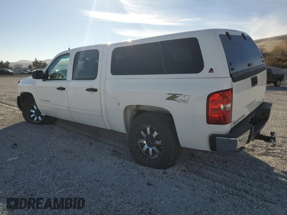 2013 Chevrolet Silverado 1500 LT with VIN 3GCPKSE72DG230652, listed as a Copart auction lot 83632464 with 121,411 mi miles and Salvage Title. Bid and sale history available at DreamBid. Image 2.