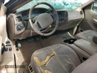 1999 Ford F-250 z VIN 1FTPX28L2XKA25212, wystawiony jako Copart lot #74911064 z przebiegiem Nie podano mil oraz Szkoda całkowita • Salvage title. Historia ofert i sprzedaży dostępna na DreamBid. Obrazek 8.