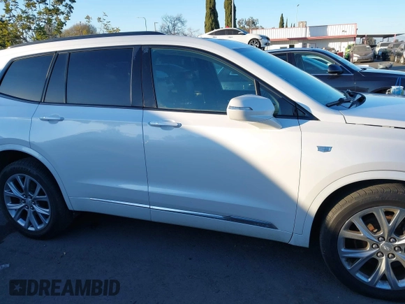 2020 Cadillac XT6 AWD Sport z VIN 1GYKPGRS3LZ197788, wystawiony jako IAAI lot #41334435 z przebiegiem 108 688 mil mil oraz . Historia ofert i sprzedaży dostępna na DreamBid. Obrazek 14.