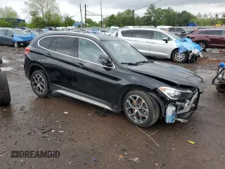 2021 BMW X1 xDrive28i with VIN WBXJG9C05M5T03982, listed as a Copart auction lot 55384025 with 24,309 mi miles and Salvage Title. Bid and sale history available at DreamBid. Image 4.