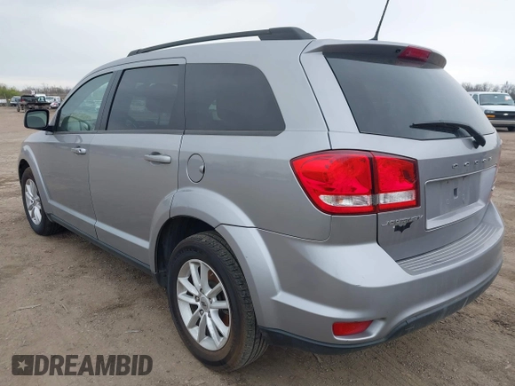 2019 Dodge Journey SE with VIN 3C4PDCBBXKT810874, listed as a IAAI auction lot 41960889 with 170,441 mi miles and . Bid and sale history available at DreamBid. Image 3.