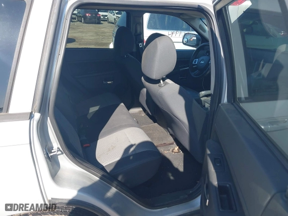 2010 Jeep Grand Cherokee Laredo with VIN 1J4PR4GK5AC161442, listed as a IAAI auction lot 41939994 with 137,376 mi miles. Bid and sale history available at carsss.com. Image 8.