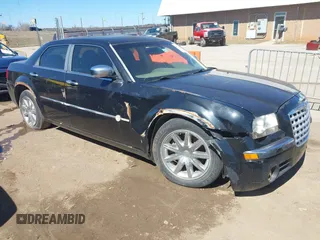 2007 Chrysler 300 C with VIN 2C3LA63H57H762801, listed as a IAAI auction lot 41724660 with 1 mi miles. Bid and sale history available at carsss.com. Image 1.