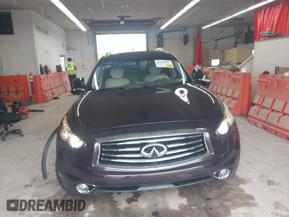 2016 Infiniti QX70 z VIN JN8CS1MW6GM752420, wystawiony jako IAAI lot #42509091 z przebiegiem 55 196 mil mil oraz . Historia ofert i sprzedaży dostępna na DreamBid. Obrazek 12.