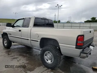 1999 Dodge 2500 z VIN 1B7KF2361XJ509781, wystawiony jako Copart lot #57282495 z przebiegiem 135 666 mil mil oraz Szkoda całkowita • Salvage title. Historia ofert i sprzedaży dostępna na DreamBid. Obrazek 2.