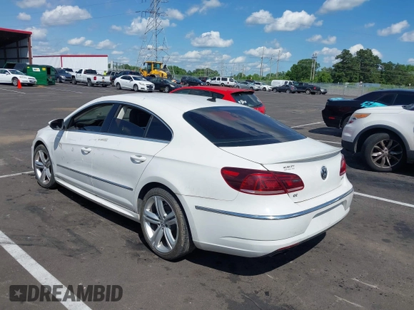 2014 Volkswagen CC R-Line with VIN WVWBP7AN7EE501064, listed as a IAAI auction lot 42220870 with Not provided miles and . Bid and sale history available at DreamBid. Image 3.