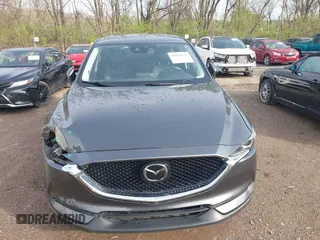 2020 Mazda CX-5 Touring with VIN JM3KFBCM8L0863951, listed as a IAAI auction lot 41921635 with 88,629 mi miles. Bid and sale history available at carsss.com. Image 12.