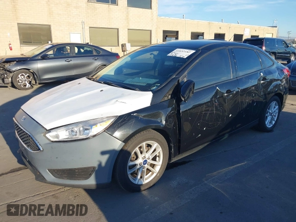 2015 Ford Focus SE with VIN 1FADP3F29FL350473, listed as a IAAI auction lot 41032182 with 102,898 mi miles. Bid and sale history available at carsss.com. Image 18.